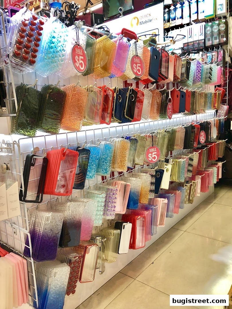 A wide selection of colorful and decorative phone cases displayed on shelves.