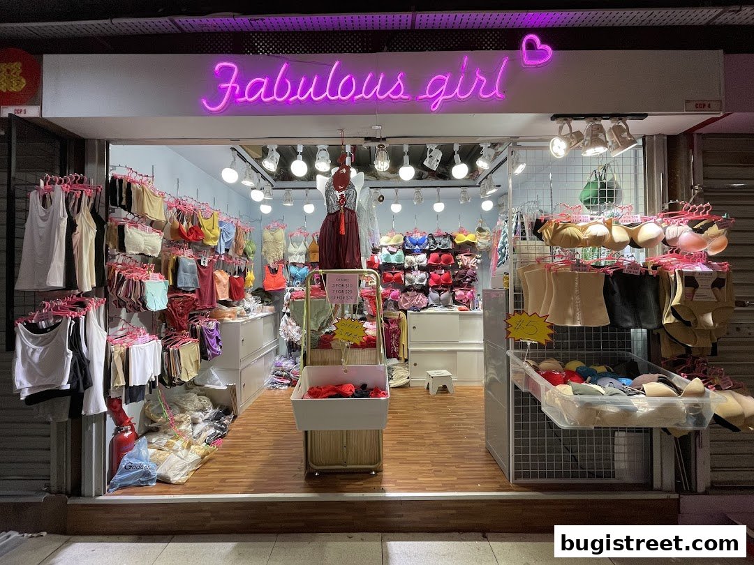 A brightly lit lingerie shop called 'Fabulous Girl' displaying various undergarments and apparel.