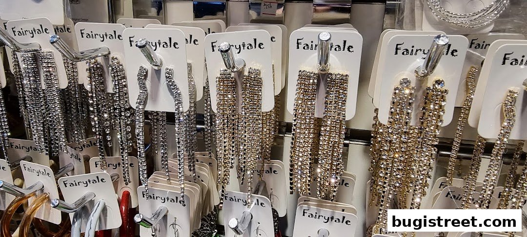 A display of sparkling, long, dangling earrings in silver and gold tones.