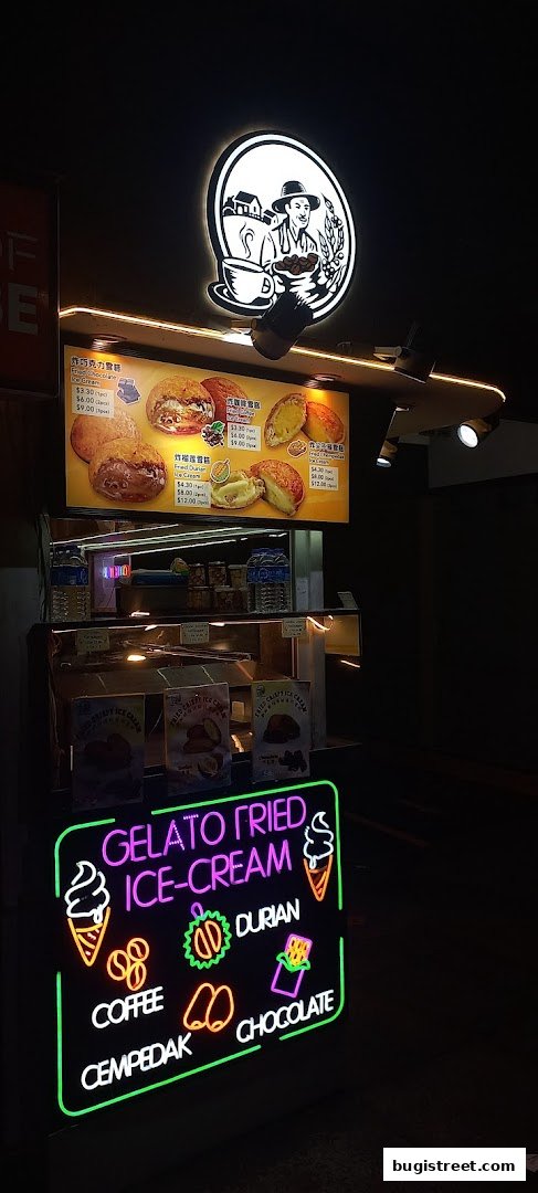 Farm Coffee shop front with illuminated menu and neon sign advertising gelato fried ice cream.
