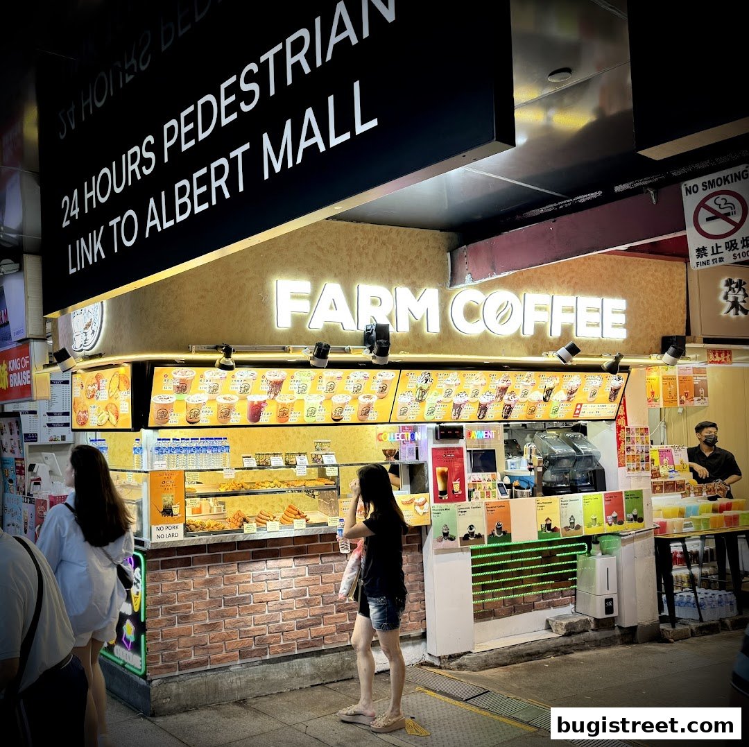 Farm Coffee shop with a menu display, food counter, and customers.