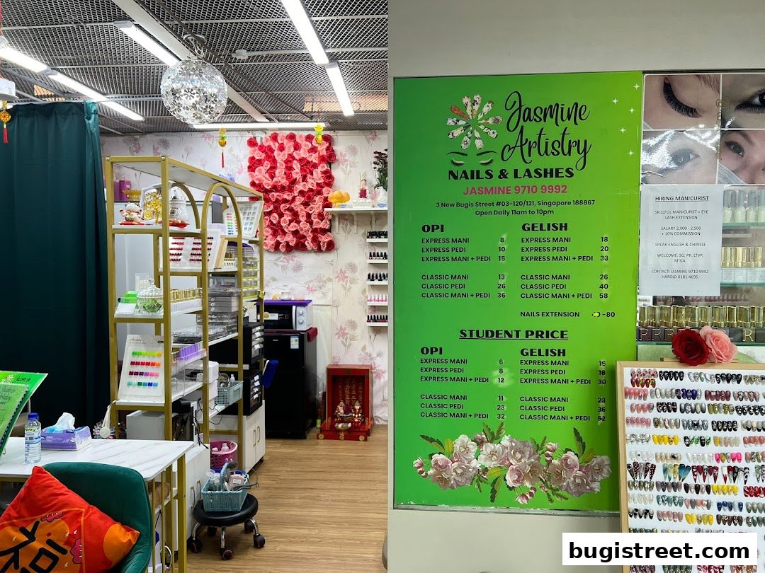 Interior of a nail salon with a price list, nail polish displays, and decorative elements.