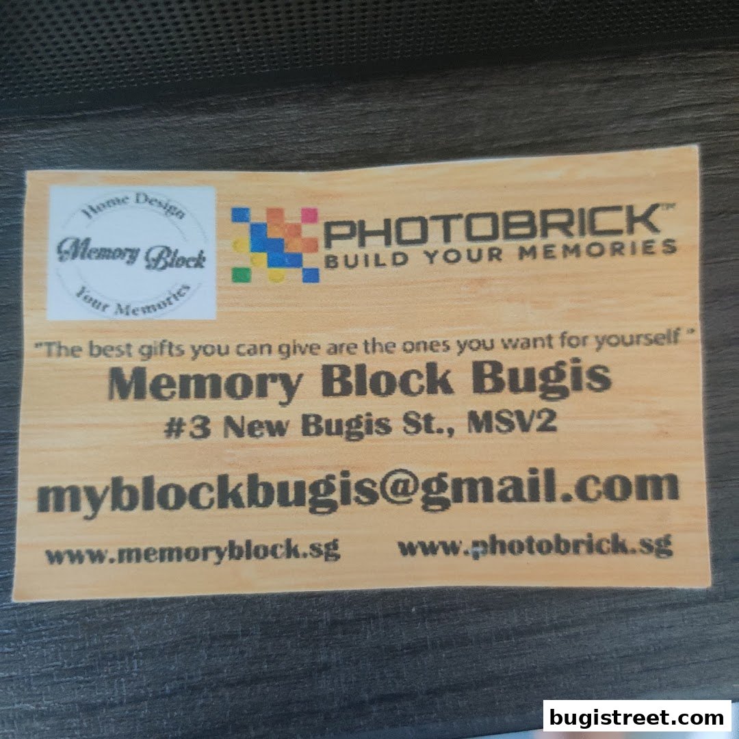 A business card for Memory Block Bugis, featuring their logo and contact information.