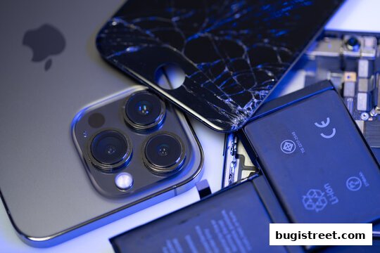 Close-up of a cracked phone screen, battery, and camera module, suggesting repair services.