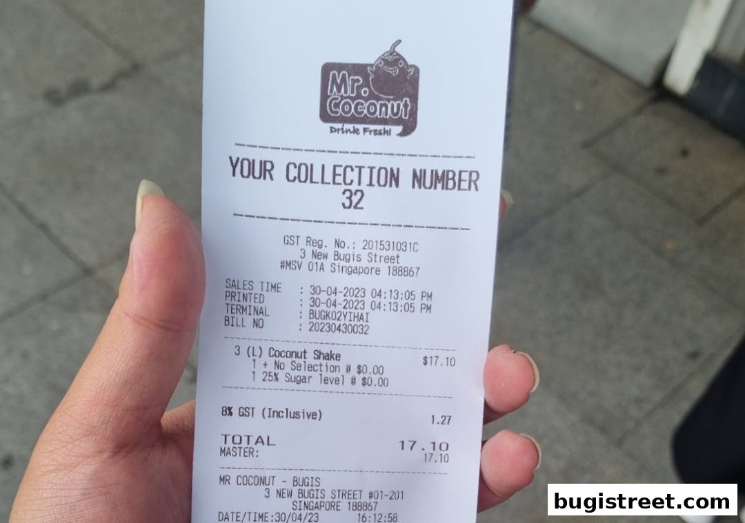 A receipt from Mr. Coconut showing a collection number and a coconut shake order.