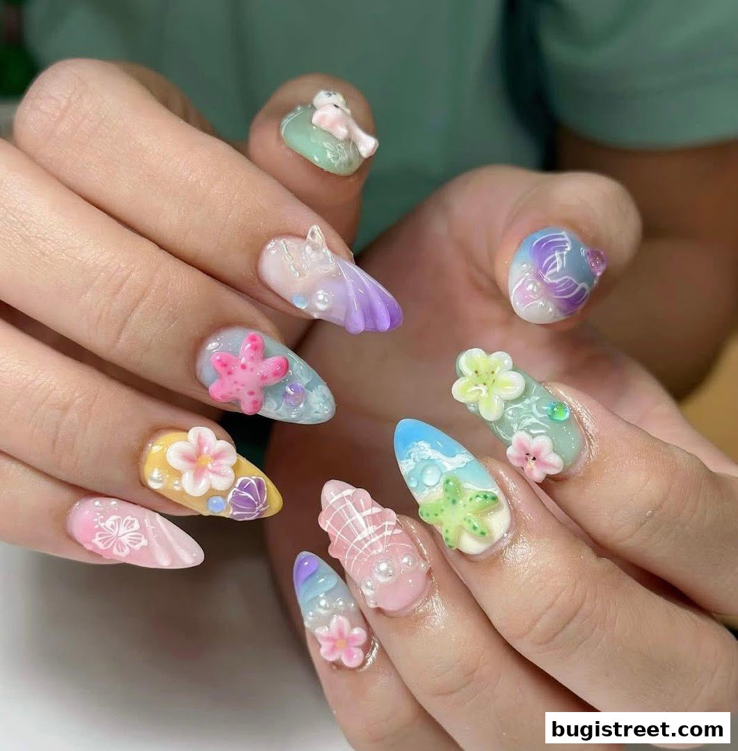 Close-up of hands showcasing elaborate 3D nail art with a summer beach theme.