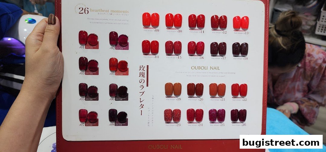 A display of nail polish colors with numbers and descriptions.