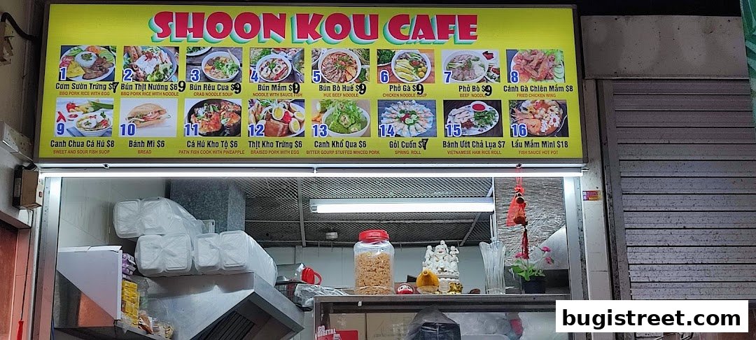 A brightly lit menu board showcasing various Vietnamese dishes with appetizing photos and prices.