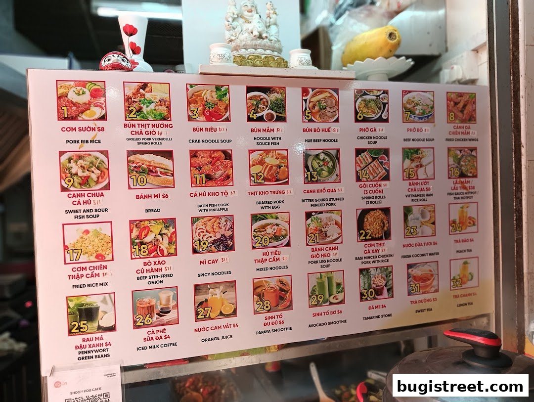 A colorful menu board displaying various Vietnamese dishes and drinks with accompanying images.