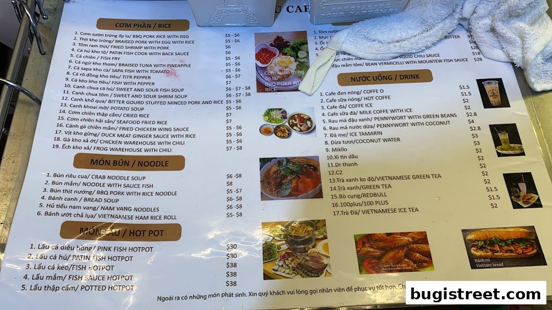 A menu from Shoon Kou Cafe with various Vietnamese dishes and drinks, featuring images of food.