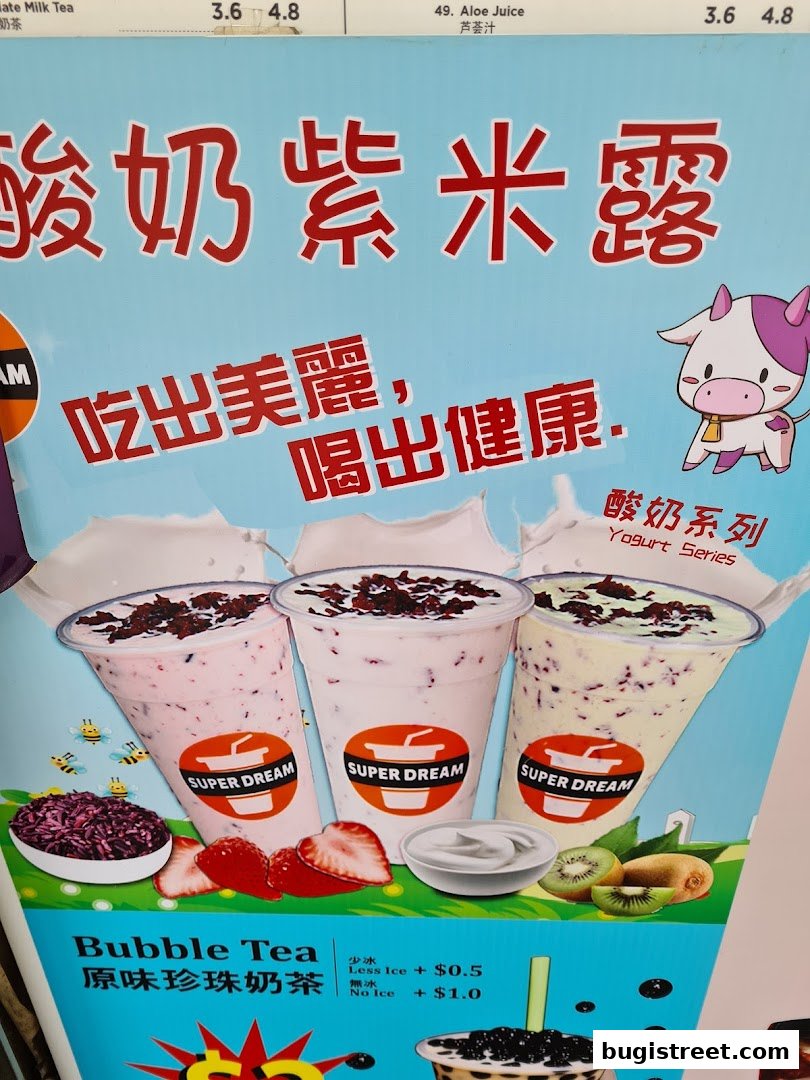 A menu featuring yogurt drinks with purple rice and bubble tea, with ingredients like strawberries and kiwi.