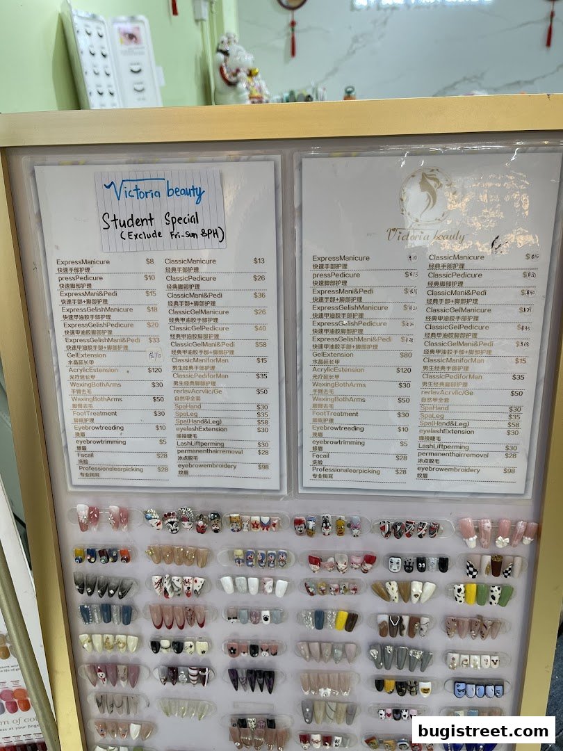 A display board showcasing nail art samples and a price list for beauty services.